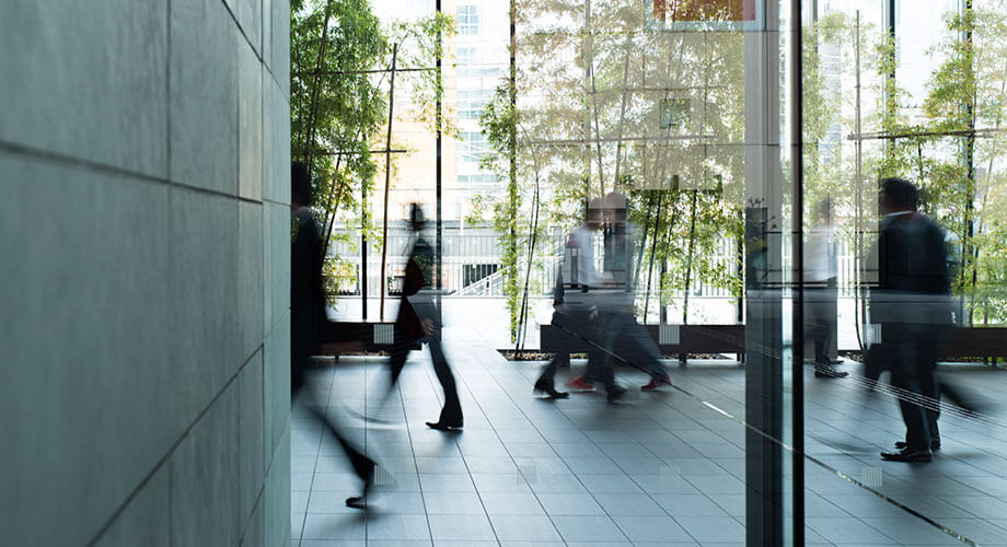 People walking in an office building